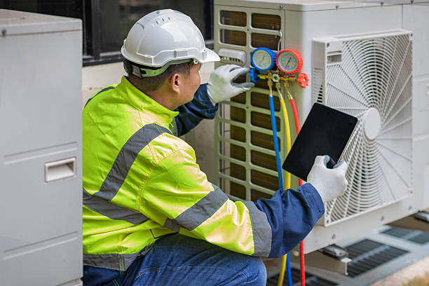 Professional Hvac technician working in Wrentham, MA